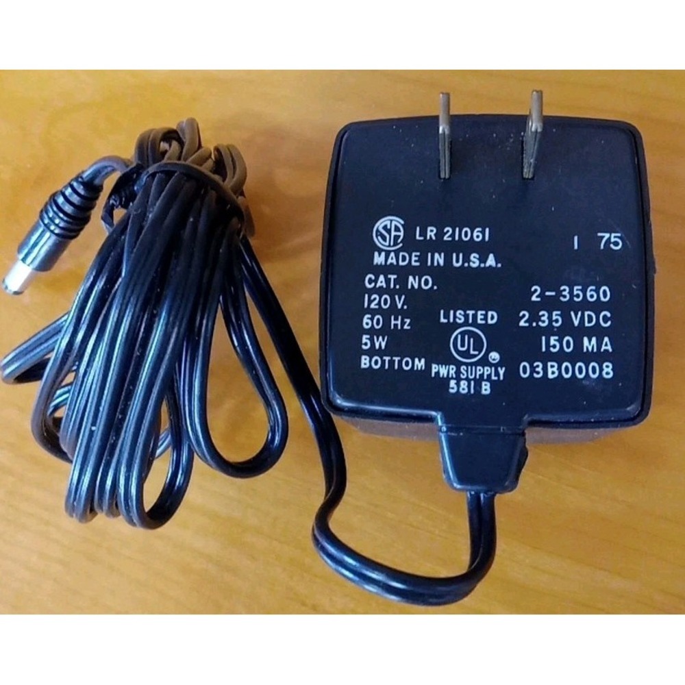 Casio LR 21061 AC Adapter Cat. No. 2-3560 Power Supply 2.35VDC 150mA
